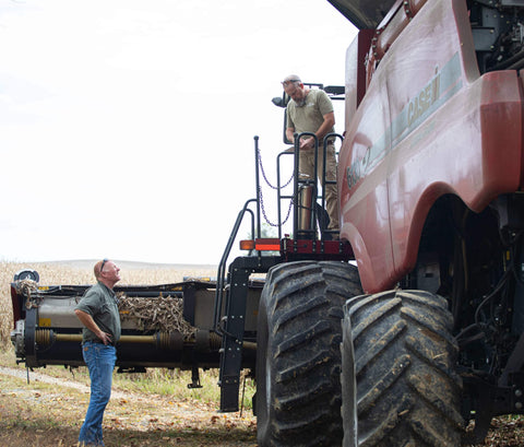 Agronomist talking to customer