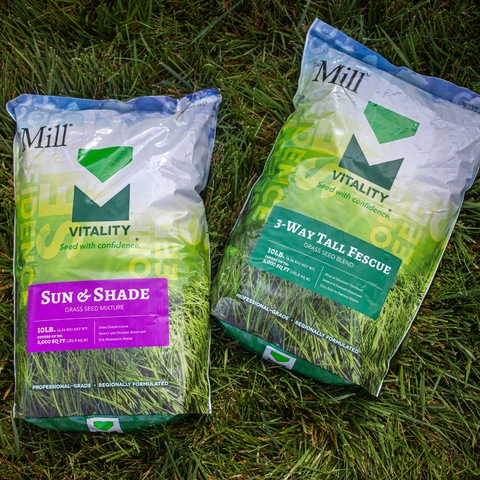 Mill grass seed bags in a lawn