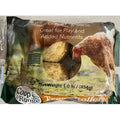 Coop & Range High Energy Treat Rollers with chicken, poultry treats for birds or small animals in a natural setting.