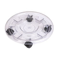 Clear plastic turntable with metal components on a white background