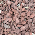 Autumn Red Stone from KolorScape, natural stone and sand mix with warm red and earthy tones for landscaping or decorative use.