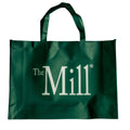 a green mill branded tote bag with a white logo