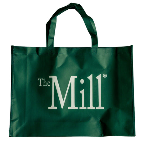 a green mill branded tote bag with a white logo