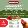 Hungrybird Golden Egg Suet Bits chicken treats for poultry, showing small, golden, egg-shaped suet pieces in a natural setting.