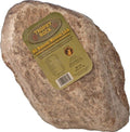 Deer licking a Trophy Rock All Natural Mineral Lick, large mineral block designed for wild deer nutrition and mineral intake.