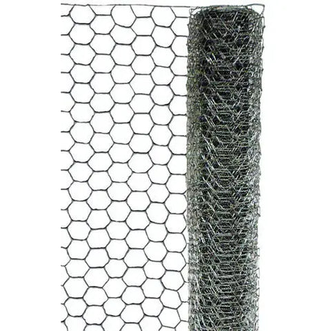 Chicken wire fencing by The Mill, poultry netting with hexagonal openings for secure bird enclosures and garden protection.