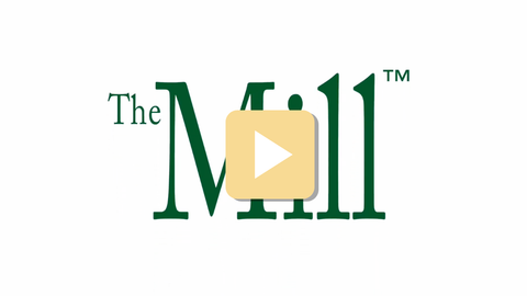 Logo of 'The Mill' with a play button symbol on a white background