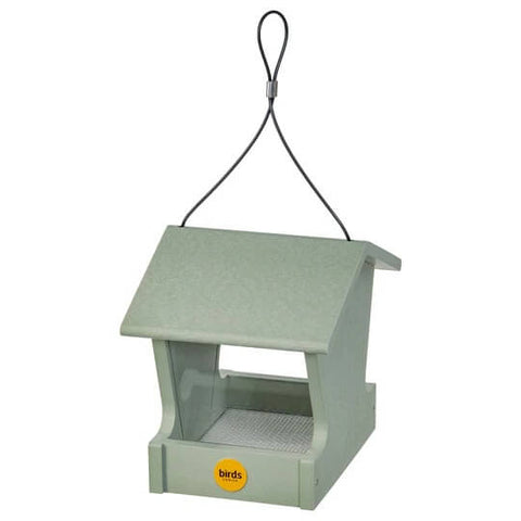 Bird's Choice Small Hopper Feeder in sage green, made from recycled plastic, showing a close-up of the feeder with seed compartments.