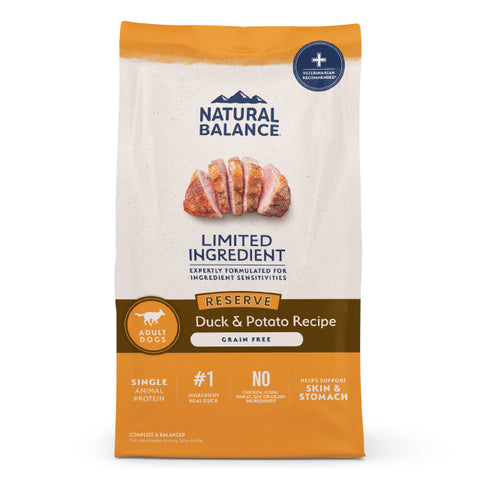 A bag of natural balance duck and potato recipe dog food on a white background