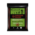 Organic Mechanics Biochar Blend soil amendment in a bag, showing the organic, rich, and earthy texture of the soil enhancer.