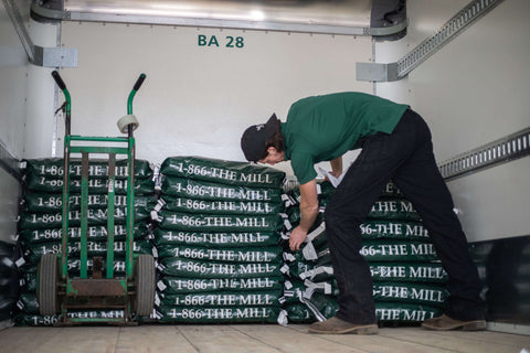 Stack of mill bags in truck