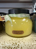 Lemon Butter Pound Cake Candle by A Cheerful Giver, scented candle with lemon and buttery notes in a decorative jar.