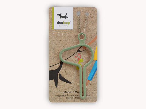 Sage dooloop® hands-free dog waste bag holder attached to a leash, designed for easy waste disposal during walks.