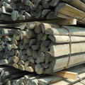 8 ft pressure-treated Half Round Fence Post by Statesman with 6-7 inch diameter, suitable for fencing projects.
