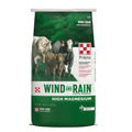 Bag of Wind and Rain High Magnesium cattle mineral with images of cows on a green background