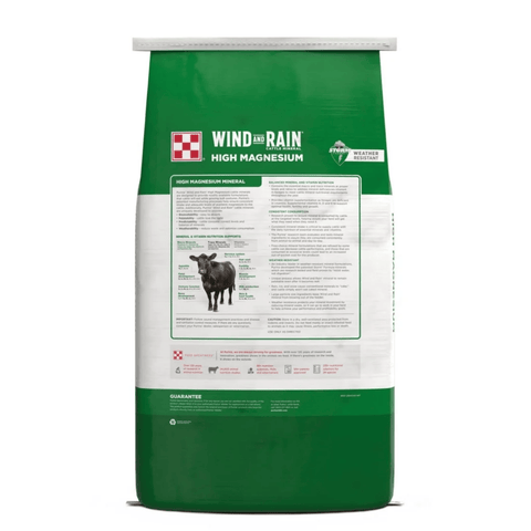 A bag of Wind & Rain High Magnesium animal supplement, featuring a green and white packaging design with a cow illustration and product details.