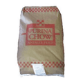 Purina 18% goat and sheep coarse feed in a 50 lb bag, showing textured feed suitable for small ruminants.