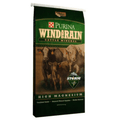 A bag of Purina Wind and Rain Cattle Mineral High Magnesium, featuring a dark green and brown design with an illustration of three cattle.