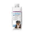 PetAg Esbilac puppy milk replacer liquid in 16 oz bottle, dog food supplement for young puppies, displayed in a clear container.