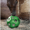 Horse using a Slow Feed Hay Ball in geren in a barn stall with hay