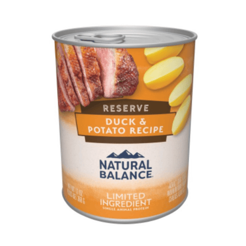 Blue Seal Natural Balance Reserve Duck & Potato canned dog food in a 13 oz can, showing the product label and contents.