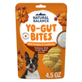 Package of Natural Balance Yo-Gut Bites with pumpkin and cranberries on an orange background