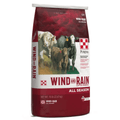 A 50 lb bag of Purina Wind and Rain All Season cattle mineral feed, featuring a red and white design with an illustration of several cows.