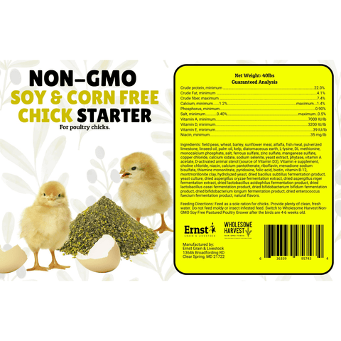 Front and back label of a non-GMO soy and corn free chick starter for poultry chicks, featuring a cartoon chick wearing a green-and-white striped diaper on a white background with egg illustrations, alongside a yellow guaranteed analysis panel with text and a barcode.