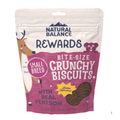 Natural Balance Rewards Bite-Size Crunchy Biscuits for small breeds, in a resealable stand-up pouch with cartoon deer and bear illustrations and a clear window showing the brown biscuits inside.