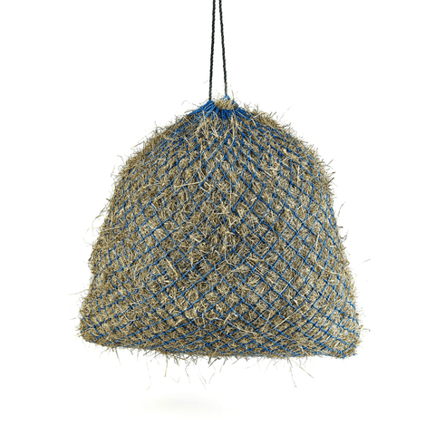 A hanging mesh bag made from natural straw-colored fibers woven with blue string, suspended by a black cord against a plain white background.