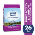 A bag of Natural Balance Sweet Potato & Venison Formula dry dog food shown on a white background, with a purple vertical banner on the right reading 'Sweet Potato & Venison Limited Ingredient Diet' and a blue badge showing '26 lbs'.