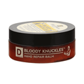 Bloody Knuckles hand repair balm jar on a white background