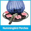 Hummingbird feeder with pink flowers and a hummingbird on a blue background