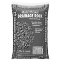 Old Castle KolorScape® Drainage Rock in 0.5 cu. ft. for lawn and garden drainage, showing colorful gravel in a garden scene.