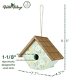 A small birdhouse with a wood-look brown roof and a white floral front panel, shown with hanging string and overlaid dimension lines and text indicating measurements of 9.75 inches tall, 7.