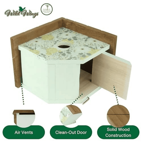 Wooden birdhouse with floral design on a white background, featuring Wild Wings branding.