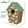 A small birdhouse with a floral front panel, green roof, and black circular entrance hole, shown with dimension lines and text indicating measurements of 6.5 inches by 4 inches by 8 inches.