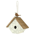 A decorative birdhouse with a brown wooden slatted roof, an off-white body with a delicate gray floral pattern, and a small brown bird figurine perched on top, set against a plain white background.