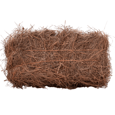 squared pine straw bale on a white background