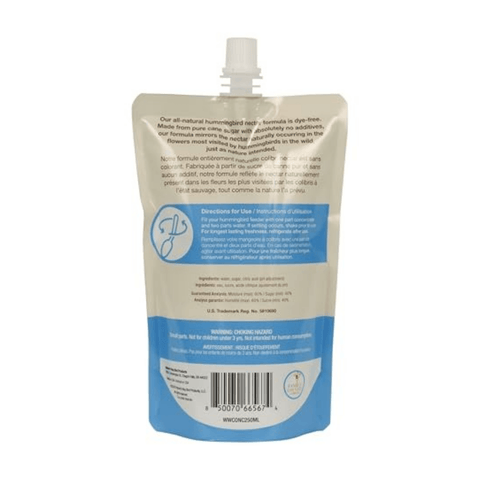 Clear hummingbird nectar concentrate in a bottle, designed for bird food, from Nature’s Way Nectar Series by Bradley Caldwell Inc.
