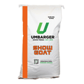 A 500 lb bag of Umbarger Show Goat Show Feeds, featuring a white bag with a prominent orange vertical stripe, a green logo, and orange and black text.
