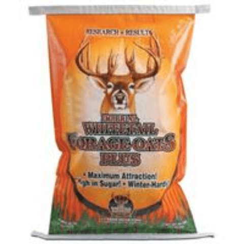 Deer feeding on Imperial Whitetail® Oats Plus by Bradley Caldwell Inc, showing a close-up of oats in a natural outdoor setting.