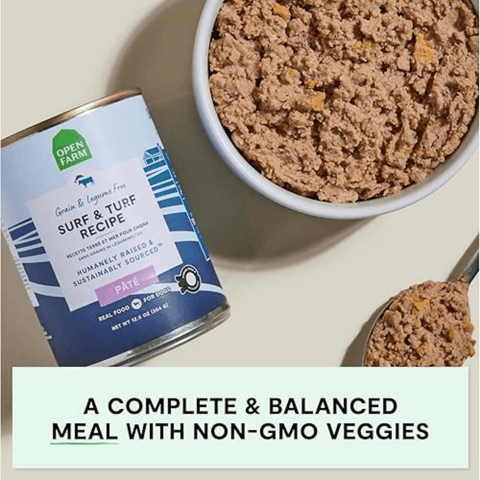 Can of Open Farm pet food with a bowl of the product on a beige background