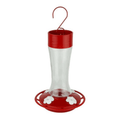 Red and clear hummingbird feeder on a white background