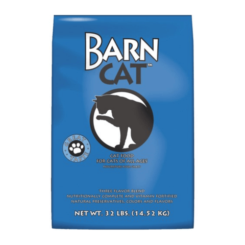 Blue Seal Barn Cat chicken, pork, and fish recipe dry cat food in a 32 lb bag, featuring a colorful label with ingredients and brand logo.