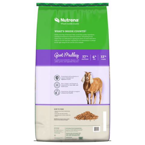 A bag of Nutrena Goat Medley organic premium goat and sheep feed, featuring a green, purple, and beige packaging design with an illustration of a goat.
