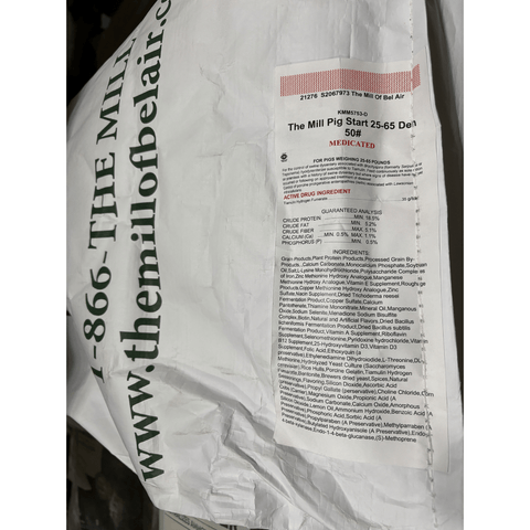 The Mill® 25–65 Starter Pig Feed Meal in a 50 lb bag, showing the pig feed product with branding and packaging details.