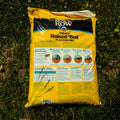 Bag of Black Kow Raised Bed Planting Mix on grass