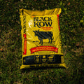 Bag of Black Kow cow manure on grass