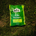 Bag of Frey Cow Manure on grass